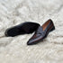 Andrew - Single component penny loafer with an elegant twisted leather tie on the facing. Hand made from the finest Calf leather with hand-stitch detailing. Soft inner naturally tanned cow leather lining. Rounded edge vegetable tanned leather sole. Finished in the very beautiful Hazelnut patina.