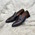 Andrew - Single component penny loafer with an elegant twisted leather tie on the facing. Hand made from the finest Calf leather with hand-stitch detailing. Soft inner naturally tanned cow leather lining. Rounded edge vegetable tanned leather sole. Finished in the very beautiful Hazelnut patina.