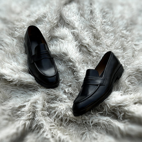 Alonso - Single component Penny loafer meticulously hand-crafted from the highest tier Black Calf leather. Featuring double soles - a leather mid sole and outer Vibram sole protector