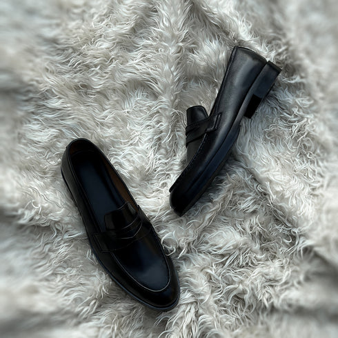 Alonso - Single component Penny loafer meticulously hand-crafted from the highest tier Black Calf leather. Featuring double soles - a leather mid sole and outer Vibram sole protector