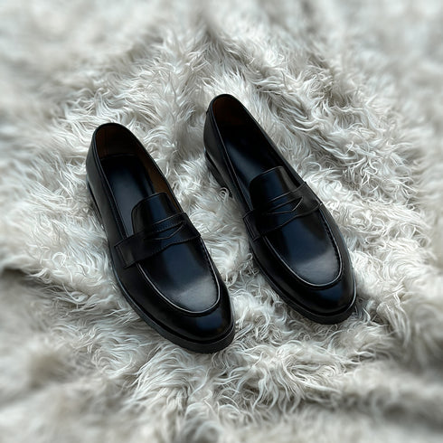 Alonso - Single component Penny loafer meticulously hand-crafted from the highest tier Black Calf leather. Featuring double soles - a leather mid sole and outer Vibram sole protector