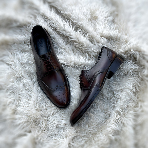 Burnam - Wing-tip derby with toe medallion and brogue detailing. Finished in the beautiful Umber patina