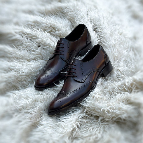 Burnam - Wing-tip derby with toe medallion and brogue detailing. Finished in the beautiful Umber patina