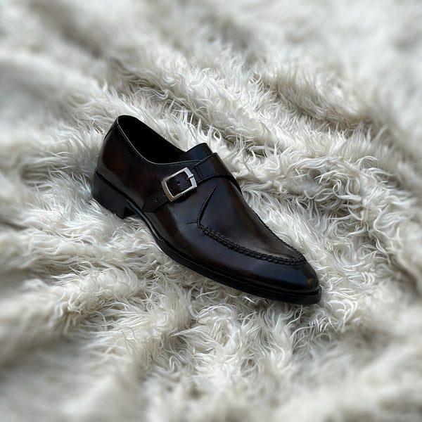 Dorian - Single Monk-strap with intricate hand-stitch detailing on the apron. Finished in the masterful Burnt Oak patina mimicking museum calf effect on the surface of the shoe.