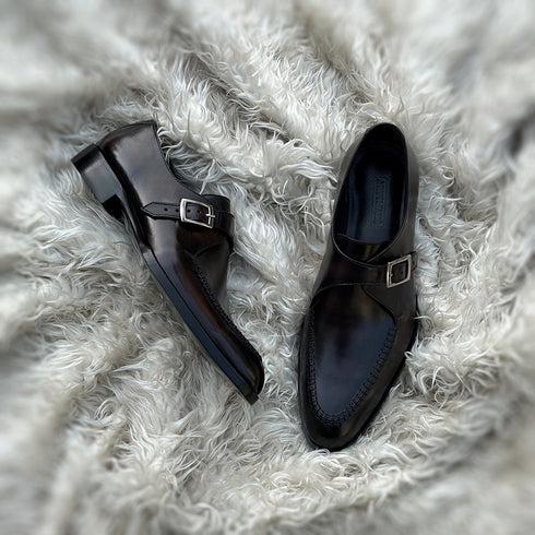 Dorian - Single Monk-strap with intricate hand-stitch detailing on the apron. Finished in the masterful Burnt Oak patina mimicking museum calf effect on the surface of the shoe.