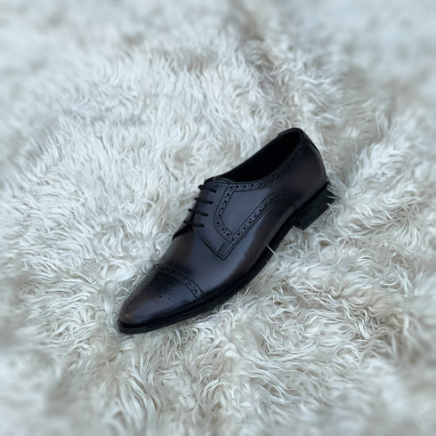 Edwin - Cap toe Derby with a beautiful medallion and brogue detailing. Finished in the unique Ashen Carob Patina