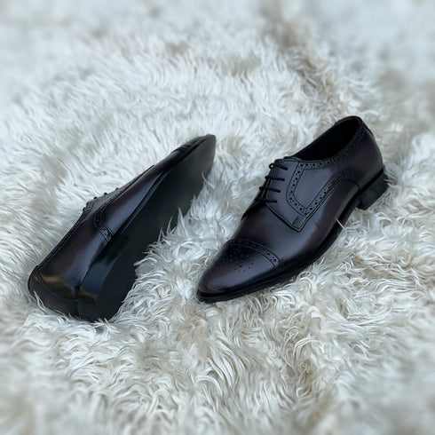 Edwin - Cap toe Derby with a beautiful medallion and brogue detailing. Finished in the unique Ashen Carob Patina