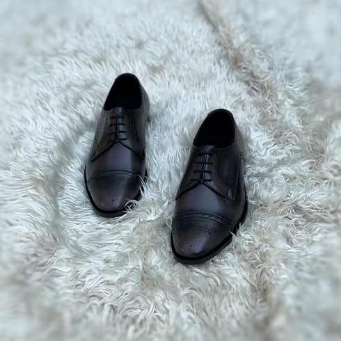 Edwin - Cap toe Derby with a beautiful medallion and brogue detailing. Finished in the unique Ashen Carob Patina