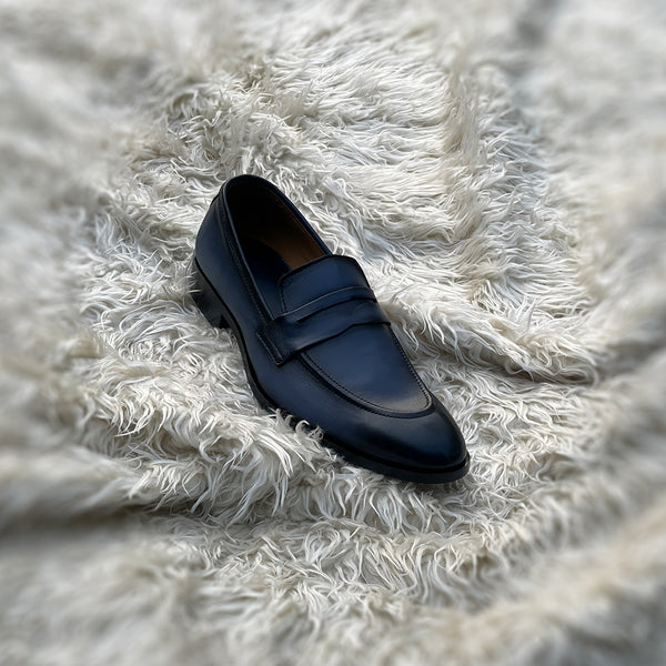 Jacob - A single component dress penny loafer made from the finest nappa leather. Finished in the very beautiful ocean mist blue patina