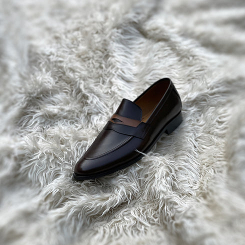 Millar 2.0 - Penny loafer made from the finest tannery dyed dark brown Calf leather along with contrasting yet complimentary leather tie detailing.