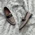 Mark - Meticulously hand-crafted Penny loafer made from the finest Suede leather. Mark features a contrasting yet complimentary pebble grain leather tie which adds visual depth to the pair.