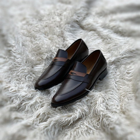 Millar 2.0 - Penny loafer made from the finest tannery dyed dark brown Calf leather along with contrasting yet complimentary leather tie detailing.