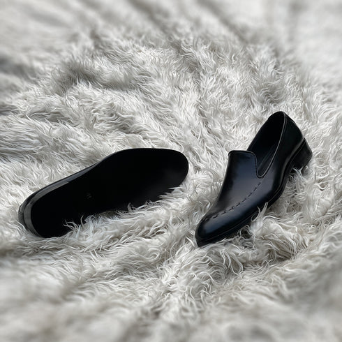 Simon - Wholecut slip-on with hand stitch detailing on the apron. Made from the finest black Calf leather, soft inner crust calf leather lining and welted vegetable tanned leather sole.
