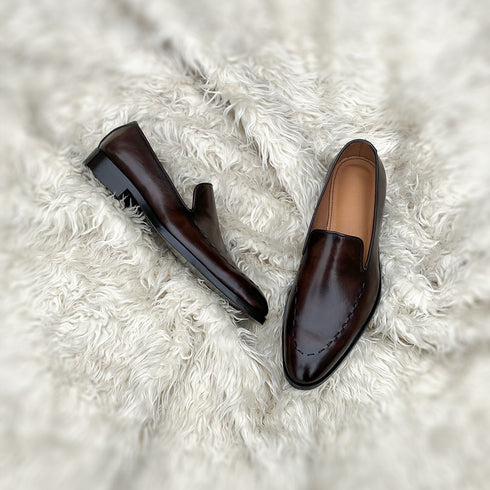 Simon - Wholecut slip-on with hand stitch detailing on the apron. Made from the finest Calf leather, soft inner crust calf leather lining and welted vegetable tanned leather sole. Finished in the beautiful gradient maple patina