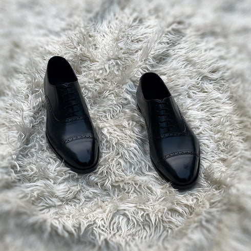 Terrance - Semi brogue Cap toe Oxford meticulously hand-crafted from the finest black calf leather.