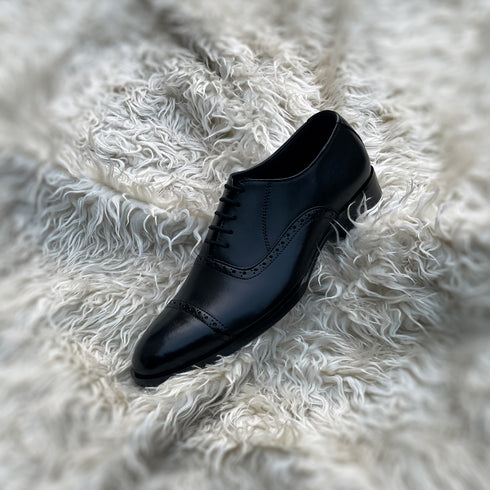 Terrance - Semi brogue Cap toe Oxford meticulously hand-crafted from the finest black calf leather.