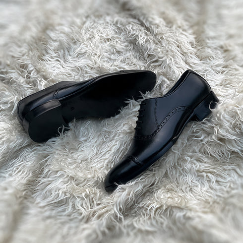 Terrance - Semi brogue Cap toe Oxford meticulously hand-crafted from the finest black calf leather.