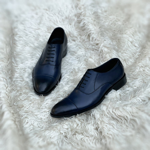 Tyler - Cap Toe Oxford made from soft blue calf leather with edge burnishing