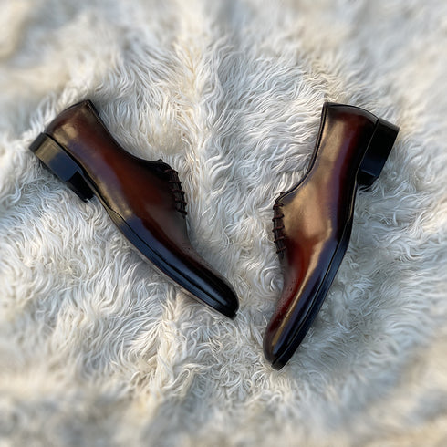 Isaac - Wholecut made from Calf leather with toe medallion detail in Mesquite Patina