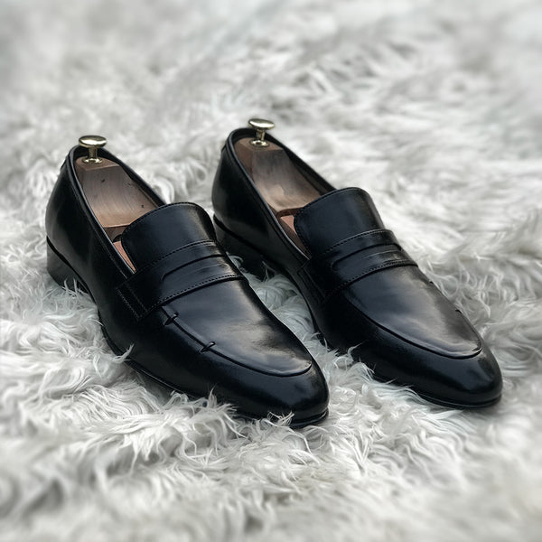 Lucas - Penny loafer with hand stitch detailing. Made from high quality Calf leather, soft inner leather lining and rounded edge leather sole