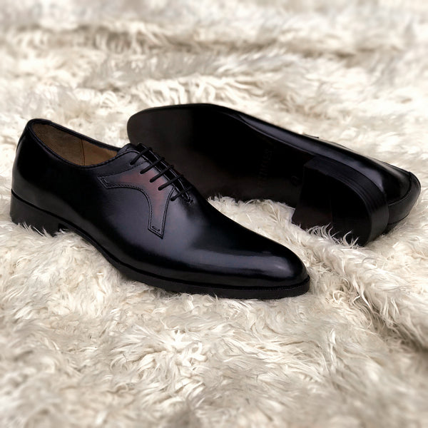 Adrian - Whole-cut made from the finest calf leather. Soft inner cow leather lining, vegetable tanned spade leather sole & full stacked leather heel